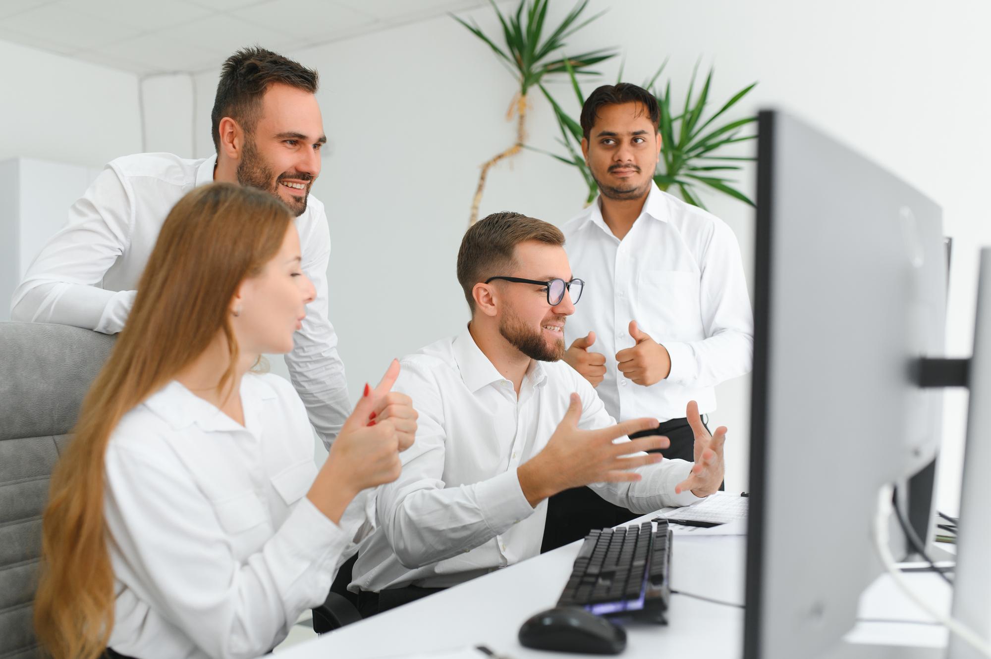 Developer team reviewing game scene